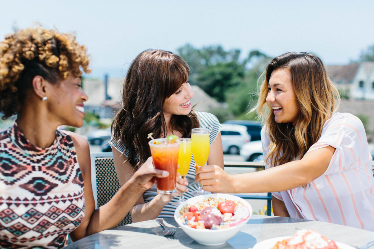 Pictures of 3 women having mimosas in Del Mar
